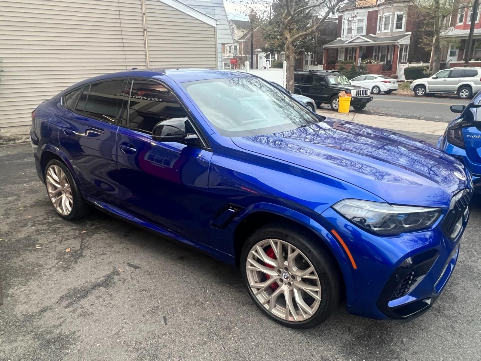 2022 Blue /Red/Black BMW X6 M Base (5YMCY0C07N9) with an 4.4L V8 DOHC 32V engine, 8A transmission, located at 1018 Brunswick Ave, Trenton, NJ, 08638, (609) 989-0900, 40.240086, -74.748085 - Holy Cow and Wow!!...That is the description on this absolutely stunning BMW X6 M Competition! Ordered by Anthony himself with the best color choice of Marina Bay Blue metallic and Red Interior to stand out on the road and to any enthusiast of the BMW X series! Executive Pkg. includes Remote Start, - Photo #23